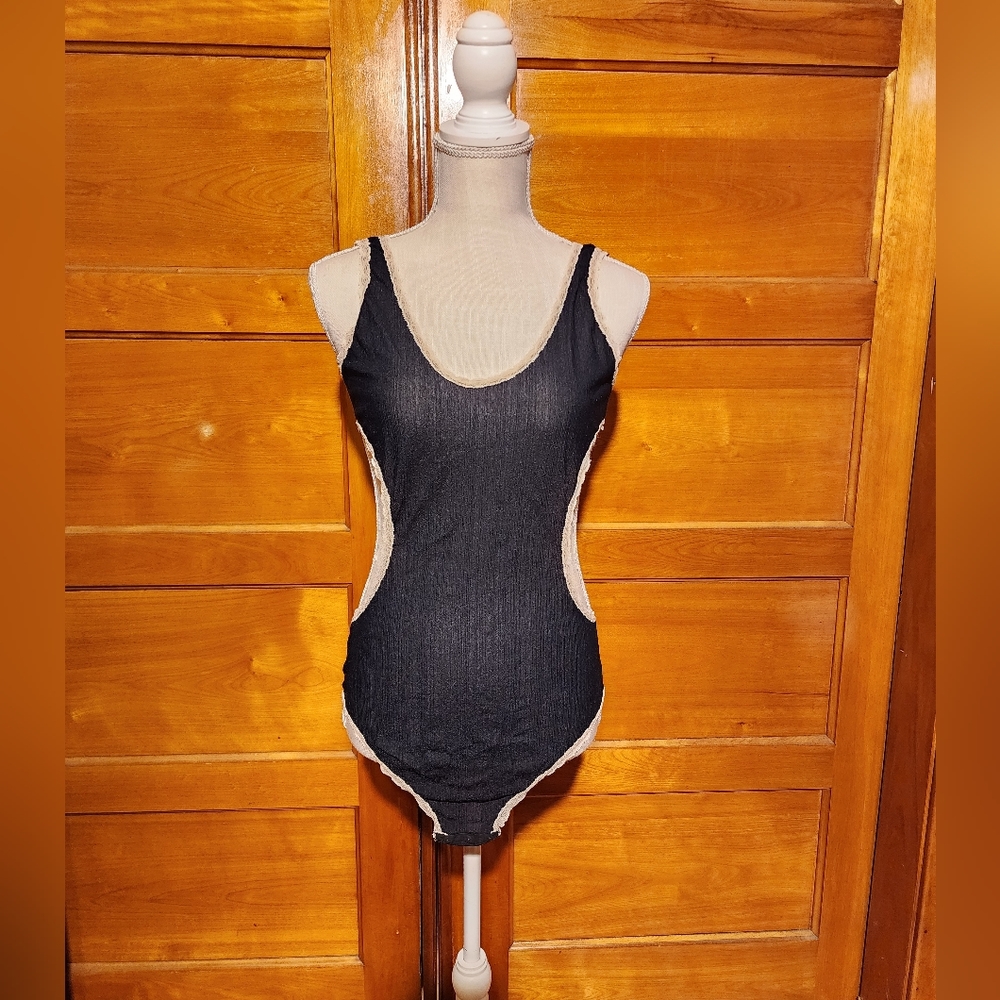 Vintage one piece w cut out lace sides